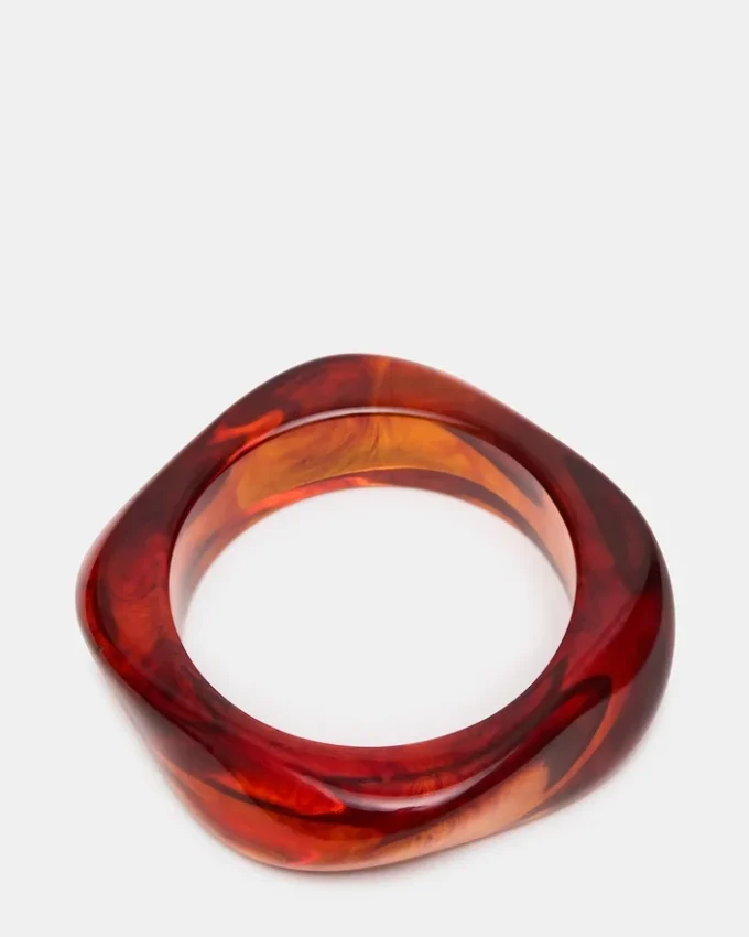 Gebogenes Retro-Armband in Naturfarben Gebogenes Retro-Armband in Naturfarben