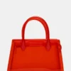 Pfirsichfarbene Jelly-Tasche in Rot
