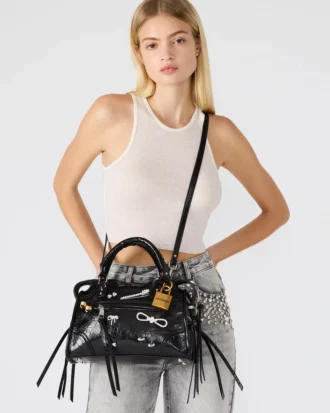 Riggs Tasche, verziert, schwarz, im Used-Look