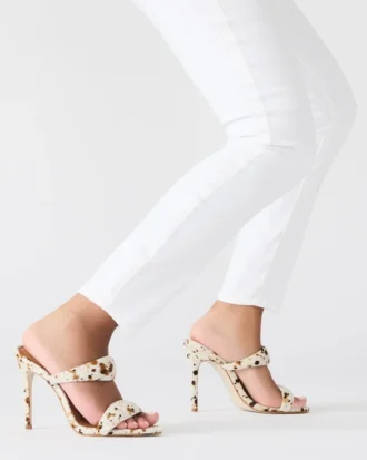 Saturn Braun mit Kuhfellmuster