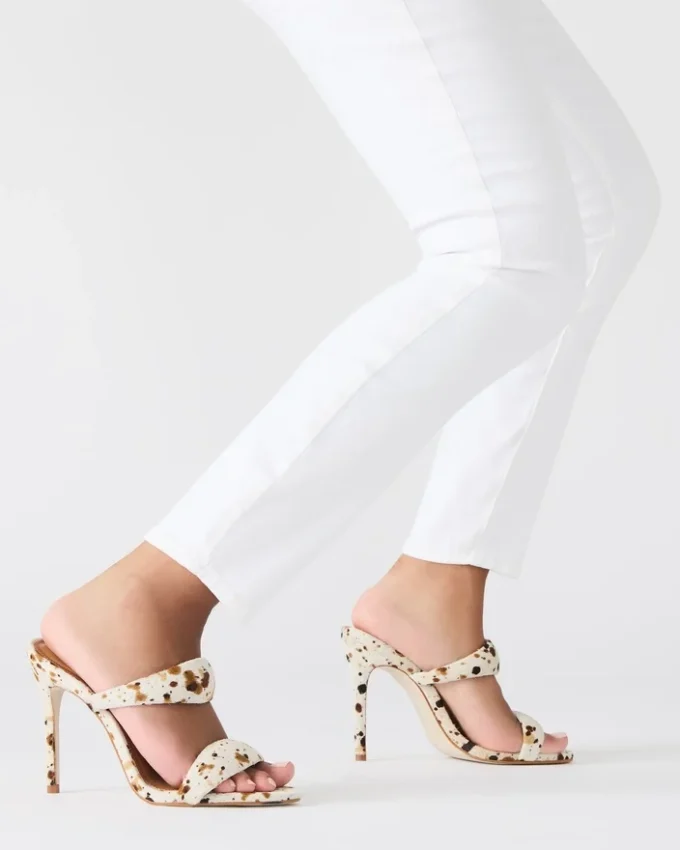 Saturn Braun mit Kuhfellmuster