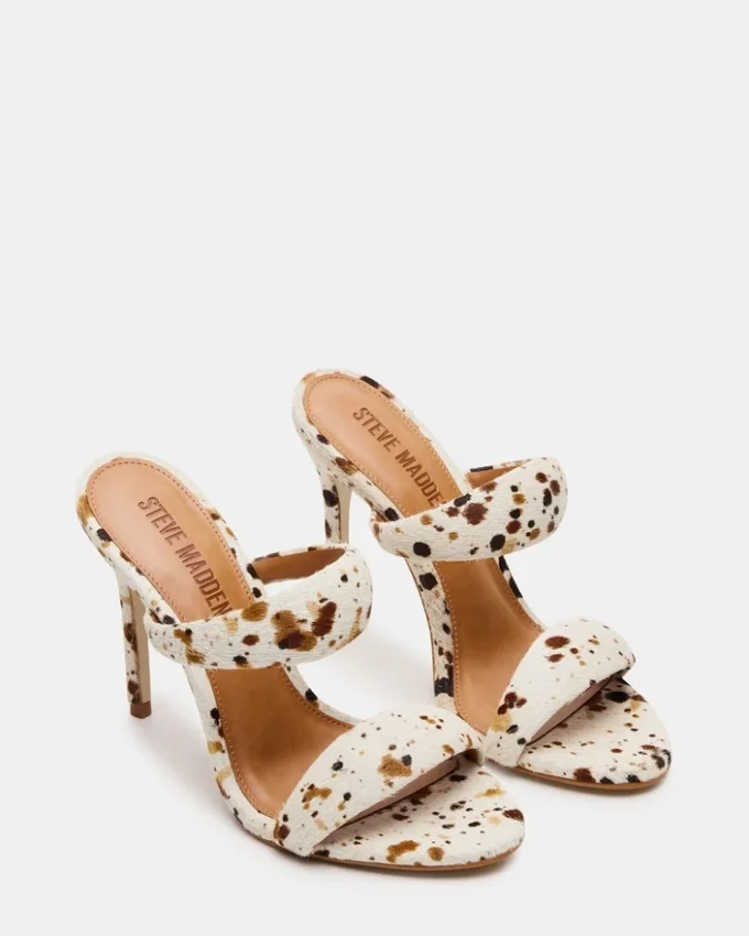 Saturn Braun mit Kuhfellmuster