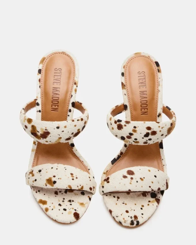 Saturn Braun mit Kuhfellmuster