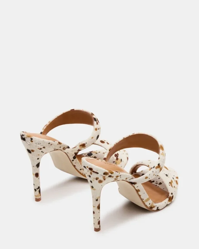 Saturn Braun mit Kuhfellmuster